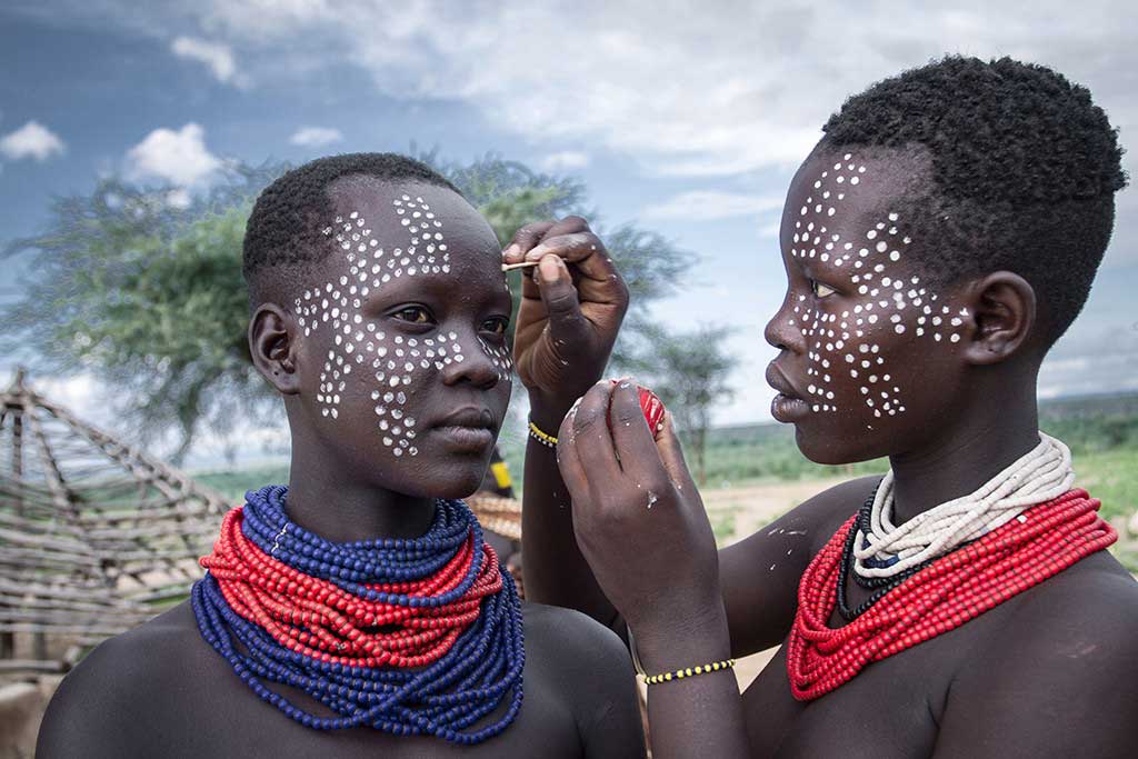 Karo tribe member with traditional face and body paint, Ethiopia
