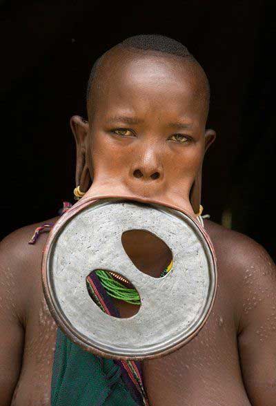 African tribal lip plate body modification tradition