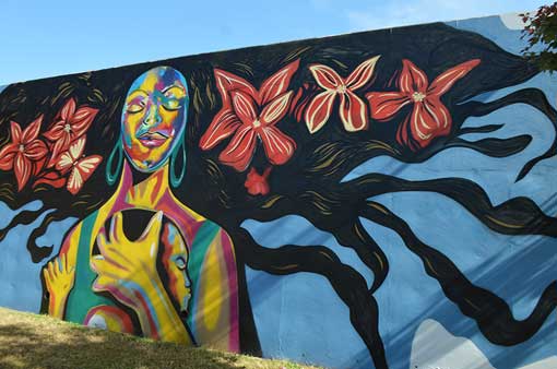 Strong Black Woman painting by Corey Barksdale, ELEVATE Atlanta mural