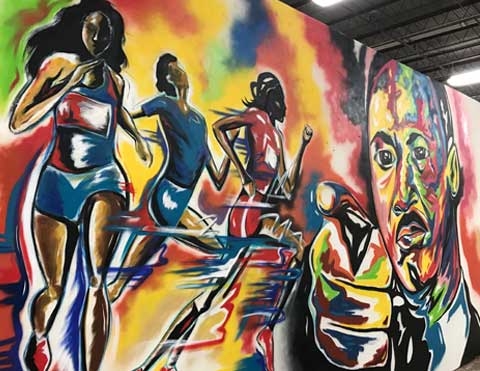 Large scale acrylic live event painting by Atlanta muralist Corey Barksdale